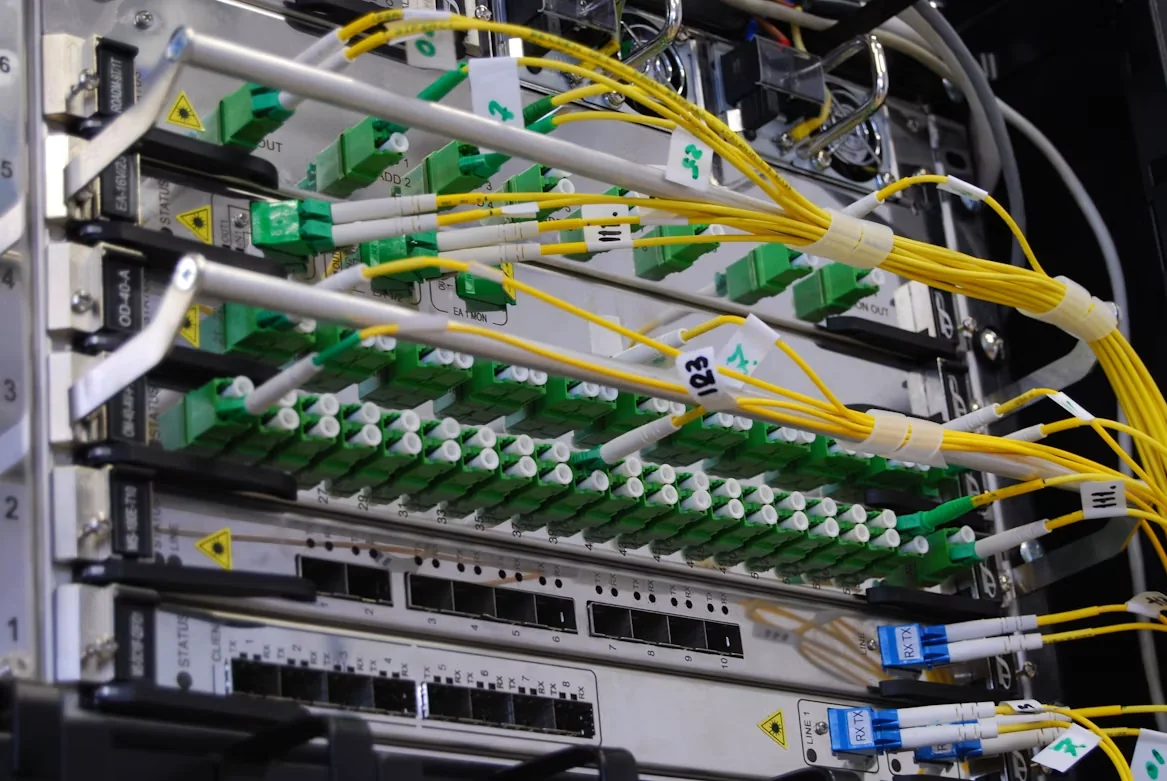 Yellow fibre patch leads connected to a distribution rack